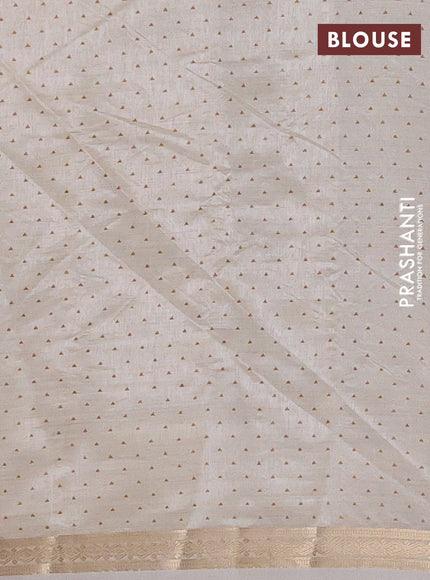 Semi raw silk saree cream with allover geometric prints and zari woven border