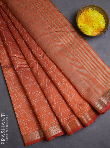 Semi raw silk saree rustic orange with allover geometric prints and zari woven border