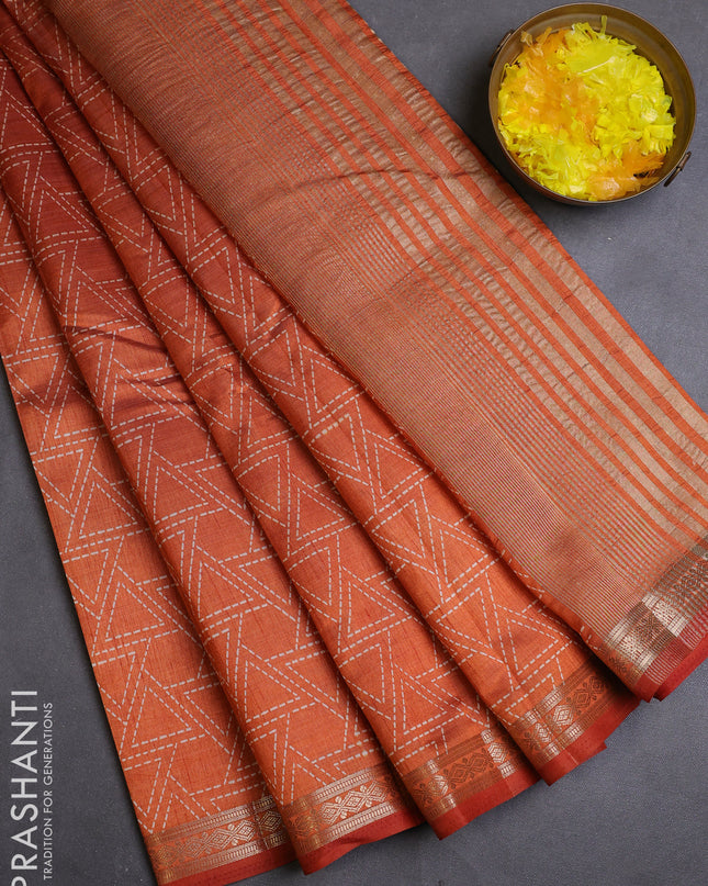 Semi raw silk saree rustic orange with allover geometric prints and zari woven border