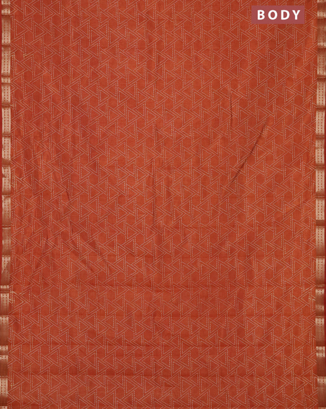 Semi raw silk saree rustic orange with allover geometric prints and zari woven border