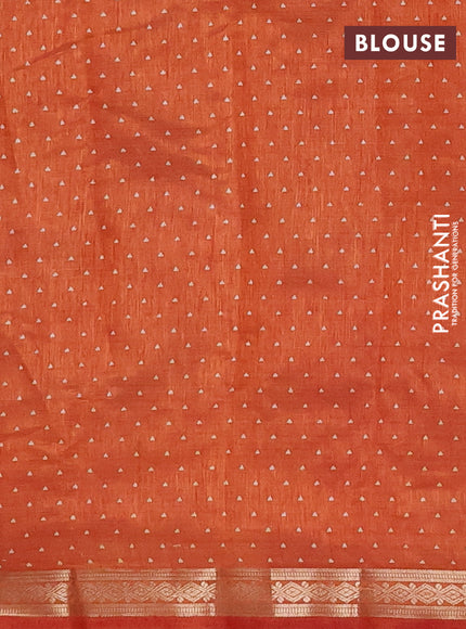Semi raw silk saree rustic orange with allover geometric prints and zari woven border