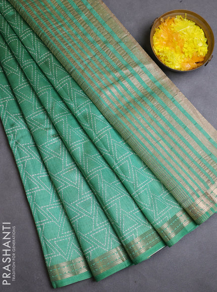 Semi raw silk saree teal green with allover geometric prints and zari woven border