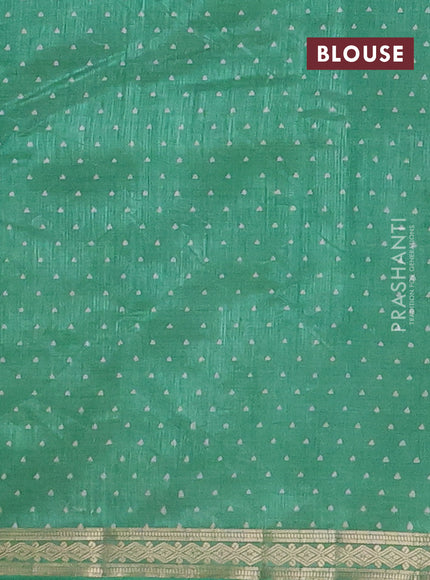 Semi raw silk saree teal green with allover geometric prints and zari woven border