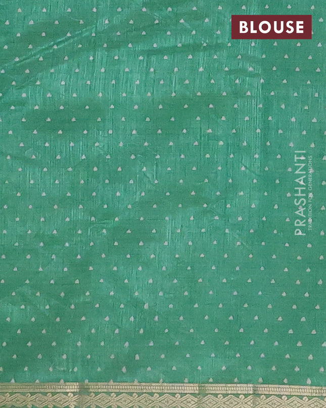 Semi raw silk saree teal green with allover geometric prints and zari woven border