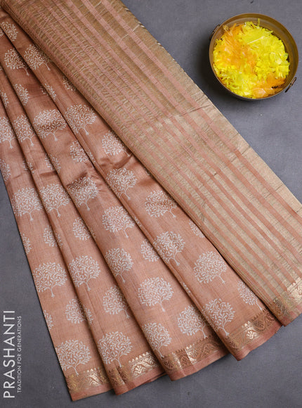 Semi raw silk saree pastel peach with allover butta prints and zari woven border