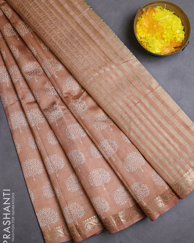 Semi raw silk saree pastel peach with allover butta prints and zari woven border