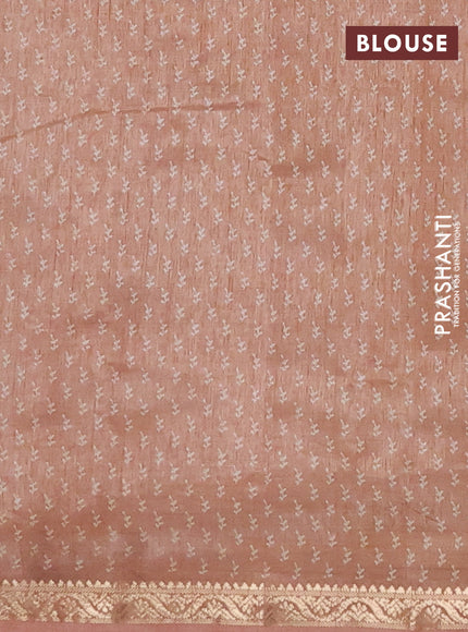 Semi raw silk saree pastel peach with allover butta prints and zari woven border