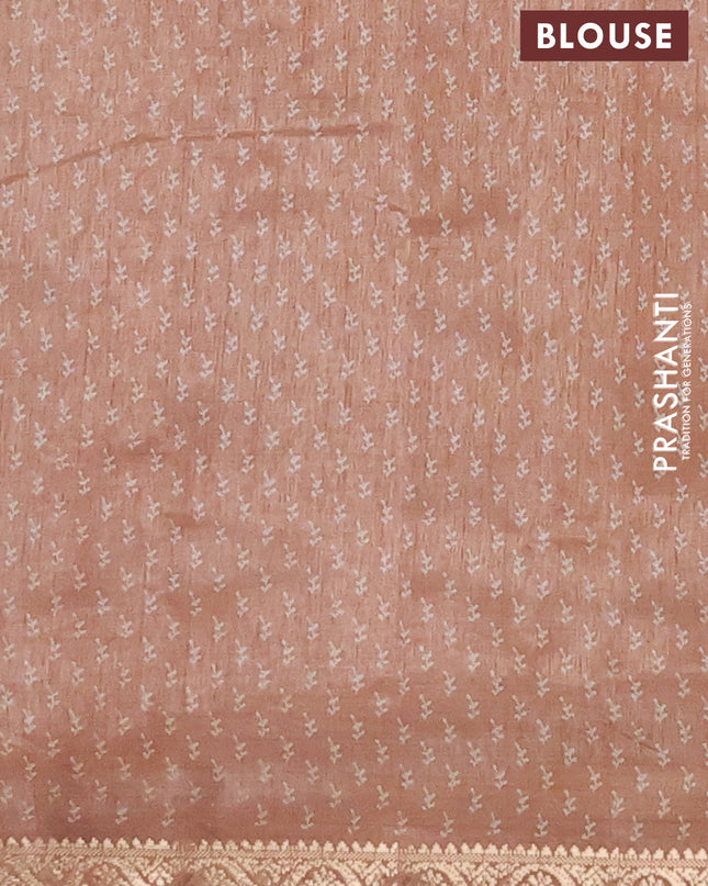 Semi raw silk saree pastel peach with allover butta prints and zari woven border