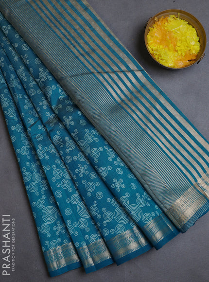 Semi raw silk saree cs blue with allover geometric prints and zari woven border