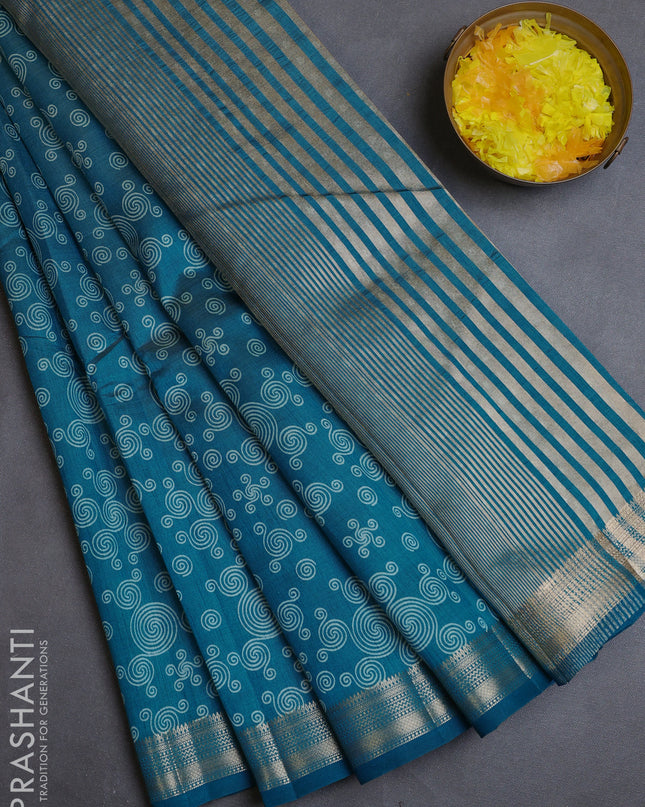 Semi raw silk saree cs blue with allover geometric prints and zari woven border