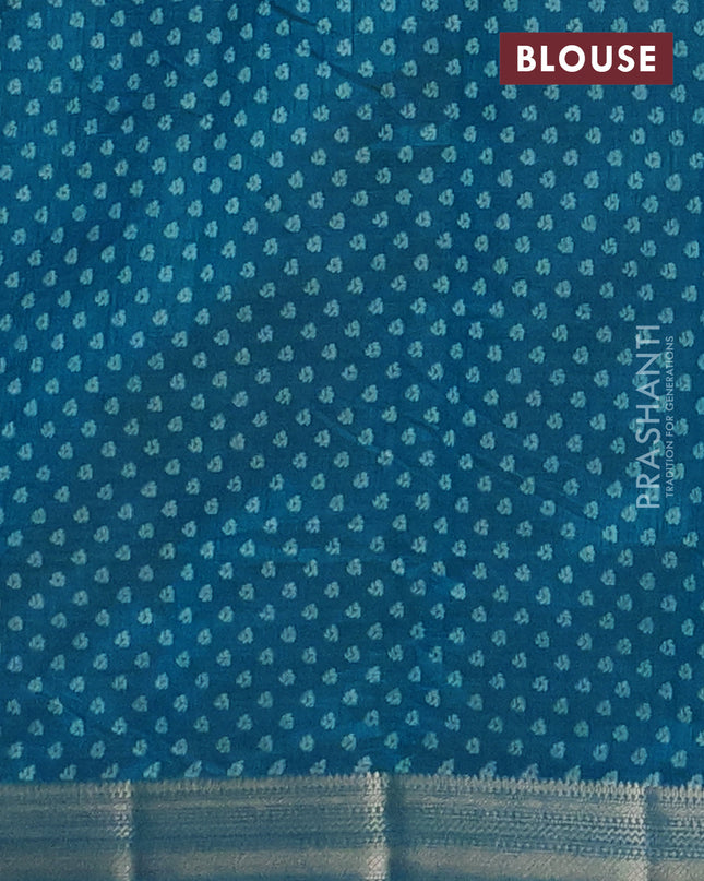 Semi raw silk saree cs blue with allover geometric prints and zari woven border