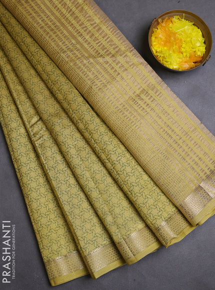 Semi raw silk saree lime yellow with allover geometric prints and zari woven border
