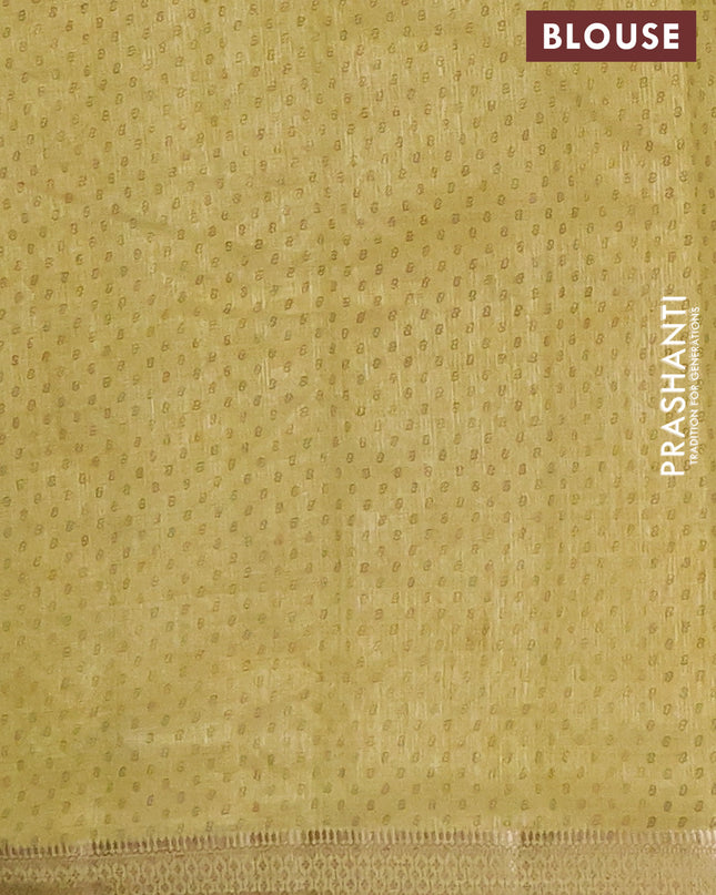 Semi raw silk saree lime yellow with allover geometric prints and zari woven border