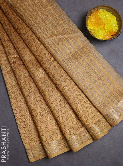 Semi raw silk saree sandal with allover geometric prints and zari woven border