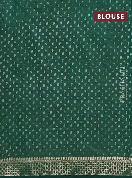 Semi raw silk saree dark green with allover geometric prints and zari woven border