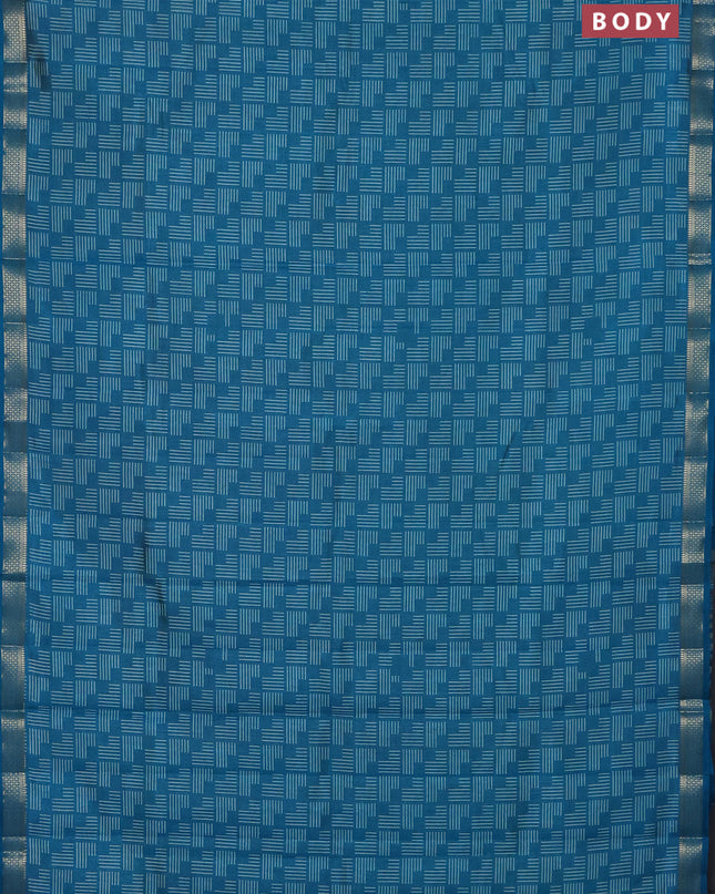 Semi raw silk saree cs blue with allover geometric prints and zari woven border