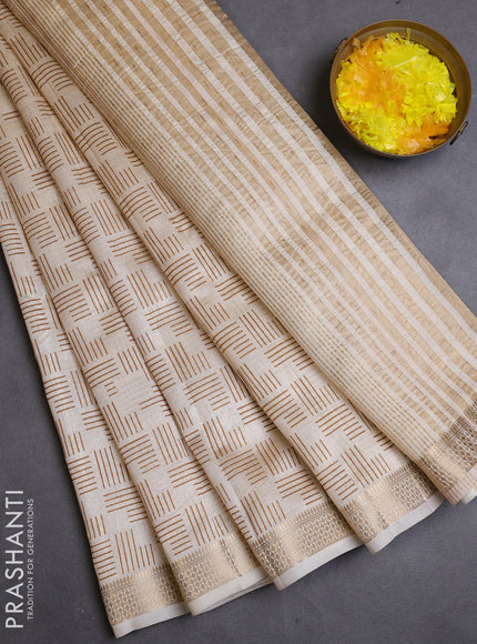 Semi raw silk saree cream with allover geometric prints and zari woven border
