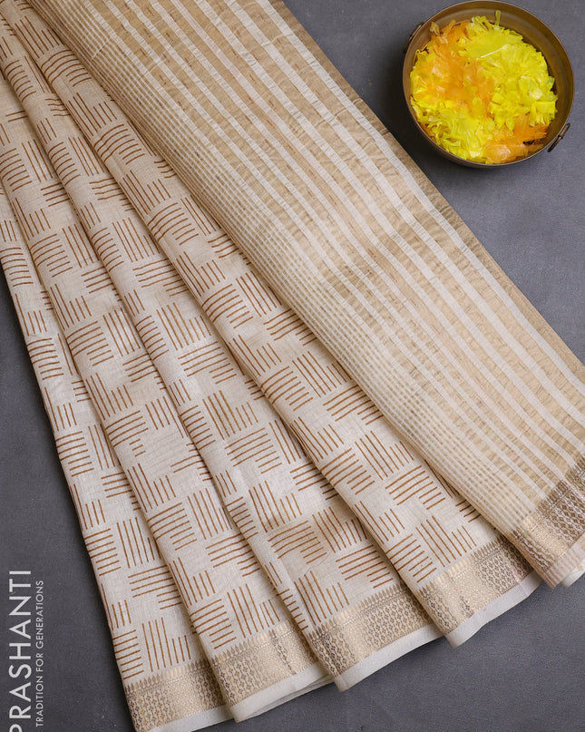 Semi raw silk saree cream with allover geometric prints and zari woven border