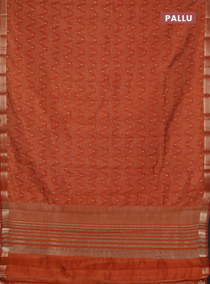 Semi raw silk saree rustic orange with allover zig zag prints and zari woven border
