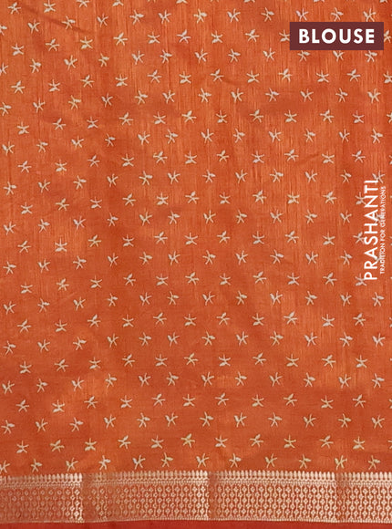 Semi raw silk saree rustic orange with allover zig zag prints and zari woven border