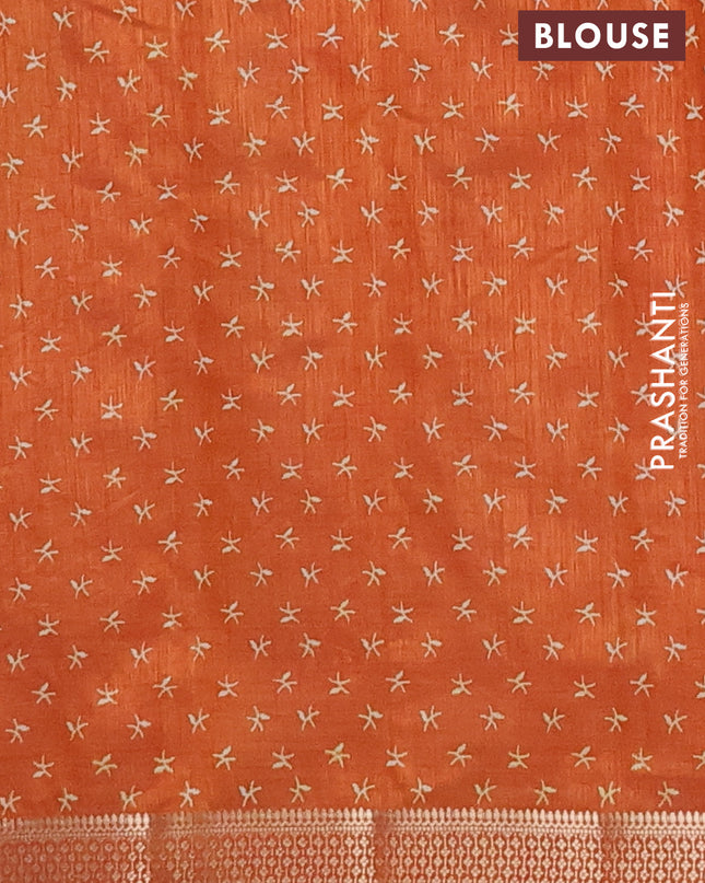 Semi raw silk saree rustic orange with allover zig zag prints and zari woven border