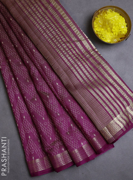 Semi raw silk saree purple with allover zig zag prints and zari woven border