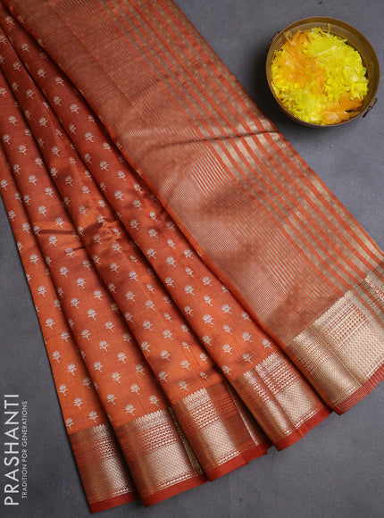 Semi raw silk saree rustic orange with allover butta prints and zari woven border
