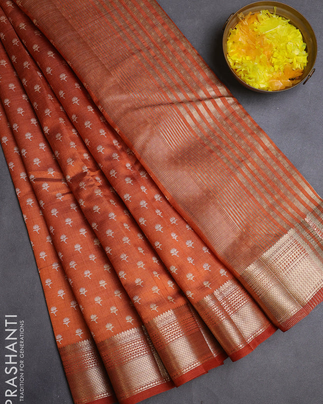 Semi raw silk saree rustic orange with allover butta prints and zari woven border