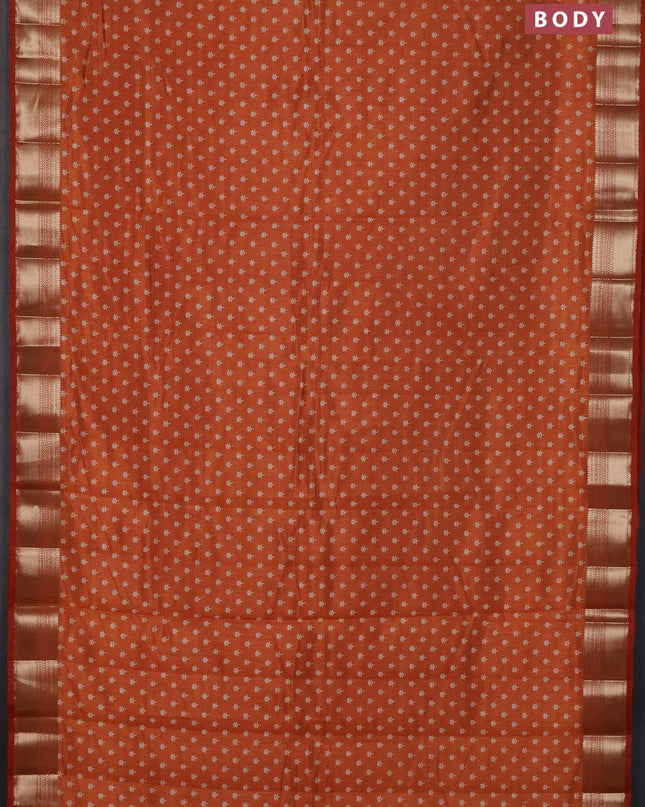 Semi raw silk saree rustic orange with allover butta prints and zari woven border
