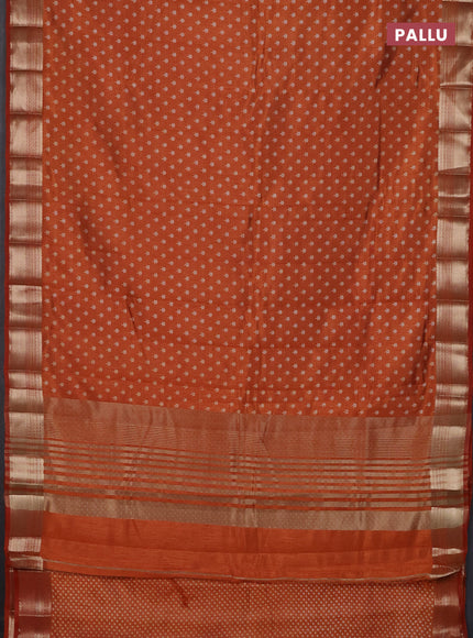 Semi raw silk saree rustic orange with allover butta prints and zari woven border