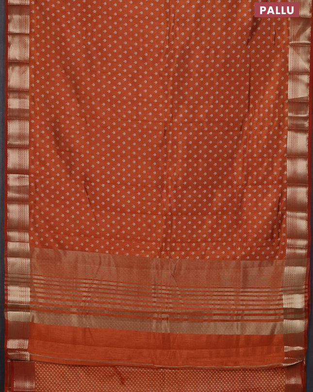 Semi raw silk saree rustic orange with allover butta prints and zari woven border