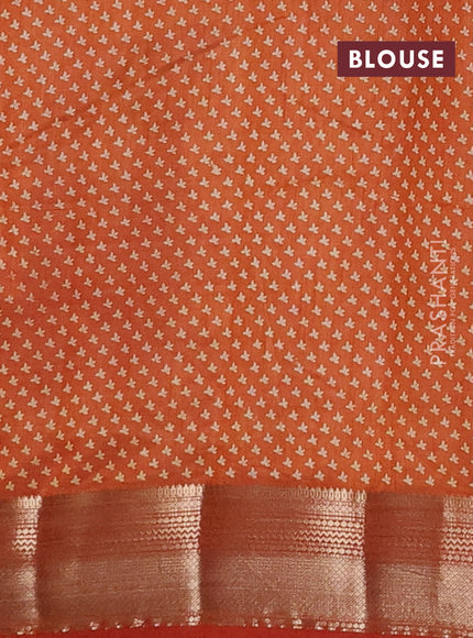Semi raw silk saree rustic orange with allover butta prints and zari woven border