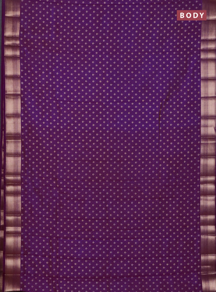 Semi raw silk saree purple with allover butta prints and zari woven border
