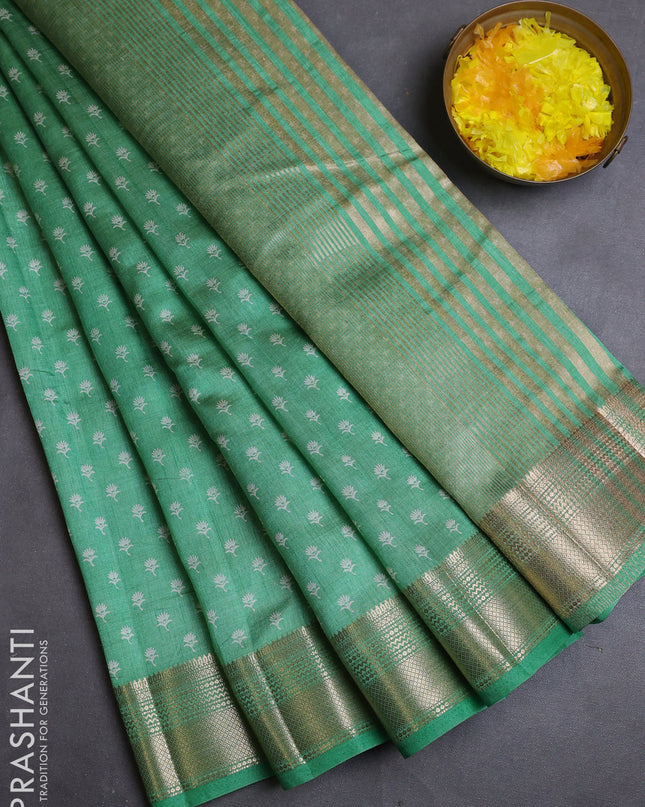 Semi raw silk saree teal green with allover butta prints and zari woven border
