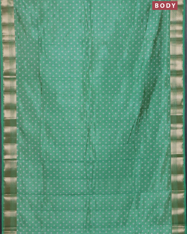 Semi raw silk saree teal green with allover butta prints and zari woven border