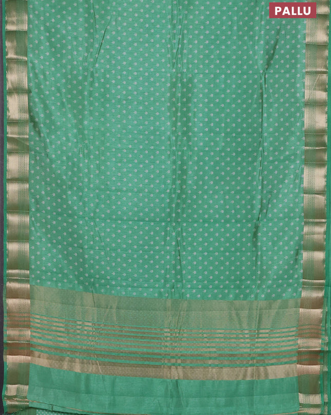 Semi raw silk saree teal green with allover butta prints and zari woven border
