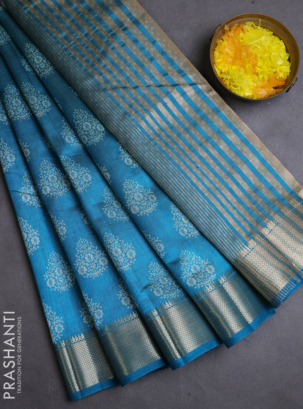 Semi raw silk saree cs blue with allover butta prints and zari woven border
