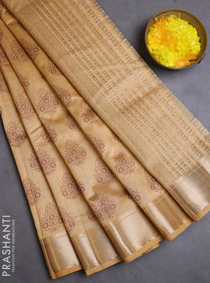 Semi raw silk saree sandal with allover butta prints and zari woven border