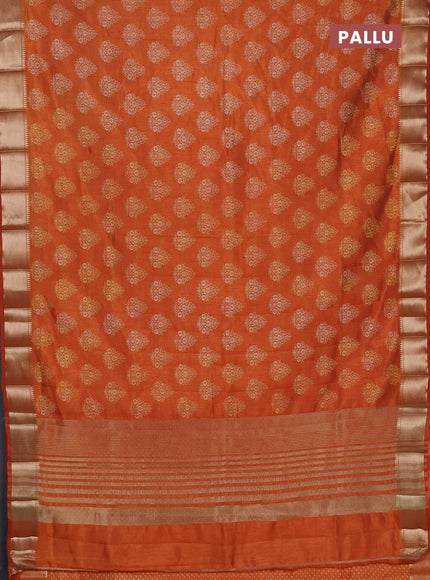 Semi raw silk saree rustic orange with allover butta prints and zari woven border