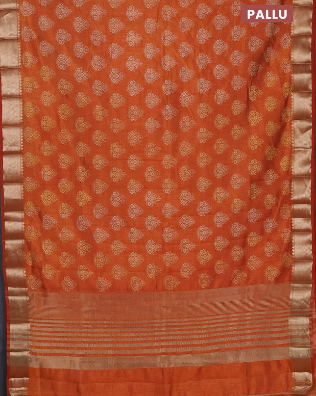 Semi raw silk saree rustic orange with allover butta prints and zari woven border