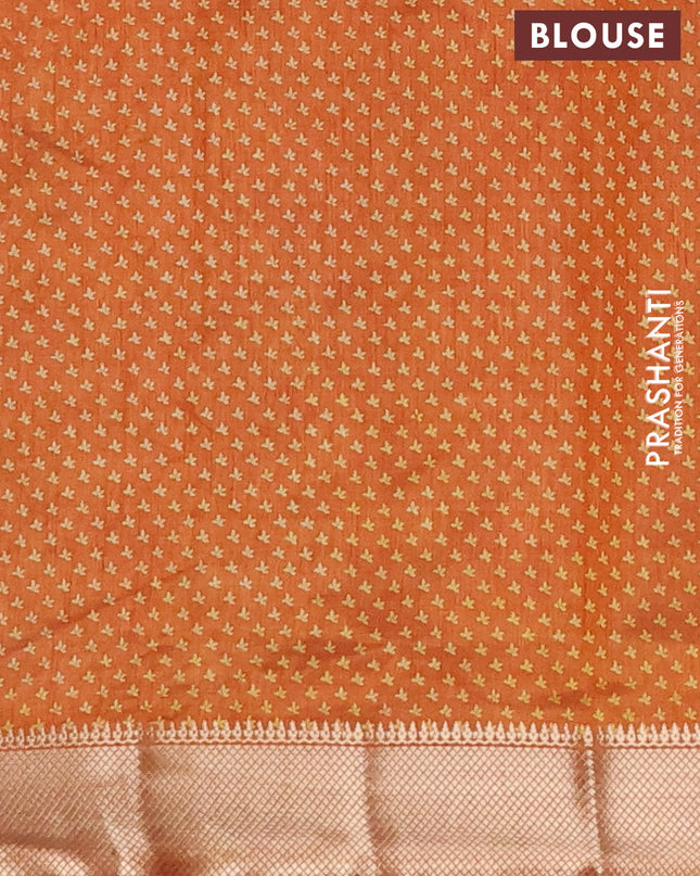 Semi raw silk saree rustic orange with allover butta prints and zari woven border
