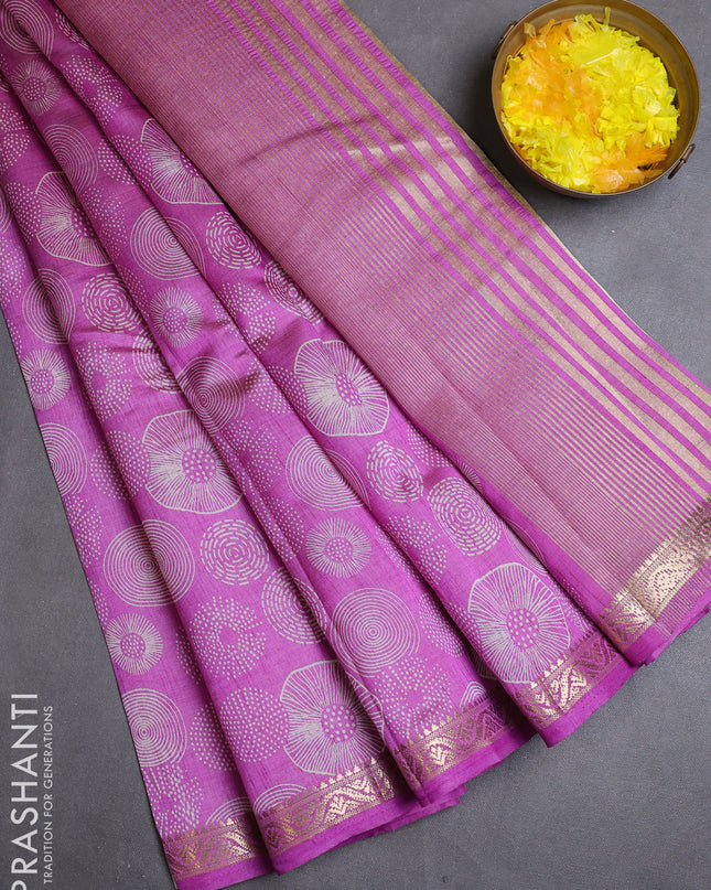 Semi raw silk saree lavender with allover prints and zari woven border