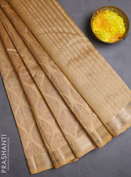Semi raw silk saree sandal with allover butta prints and zari woven border