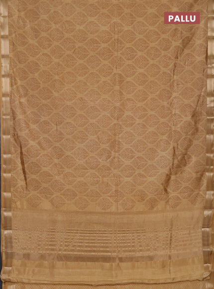 Semi raw silk saree sandal with allover butta prints and zari woven border