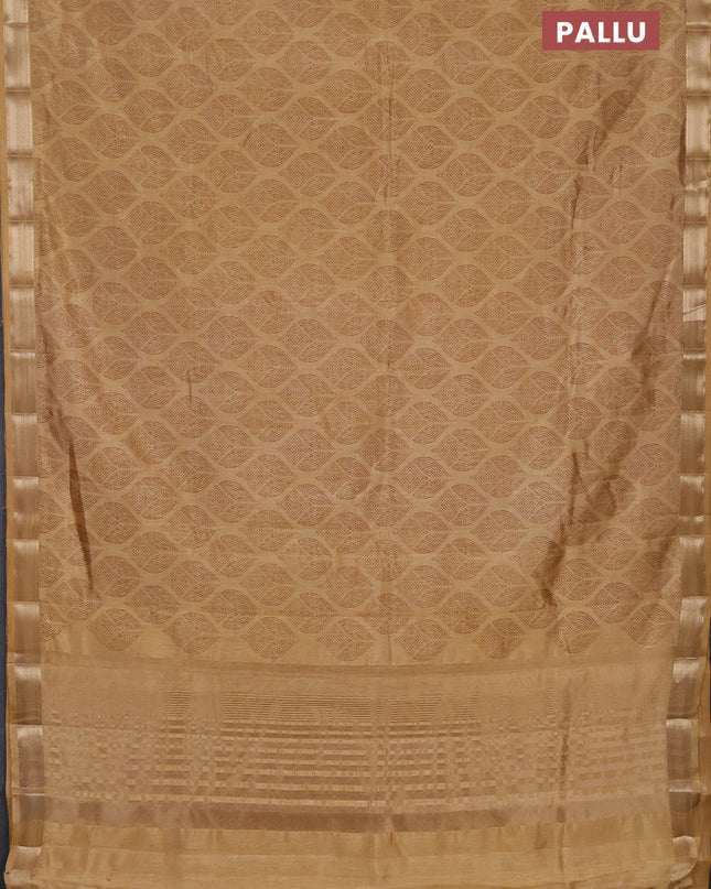 Semi raw silk saree sandal with allover butta prints and zari woven border