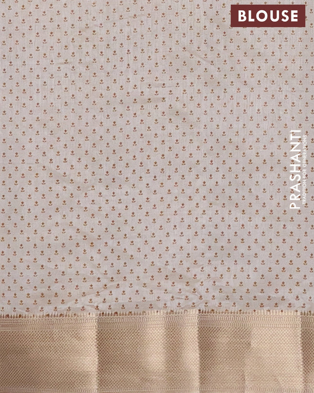 Semi raw silk saree cream with allover butta prints and zari woven border