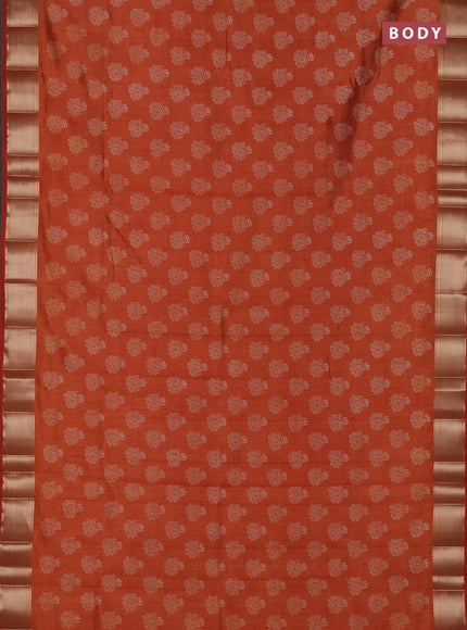 Semi raw silk saree rustic orange with allover butta prints and zari woven border