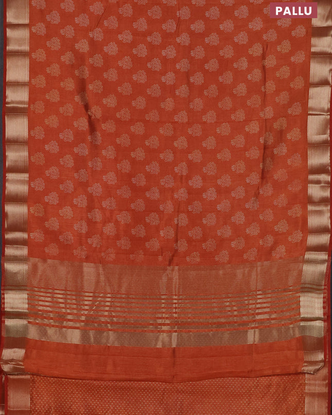 Semi raw silk saree rustic orange with allover butta prints and zari woven border