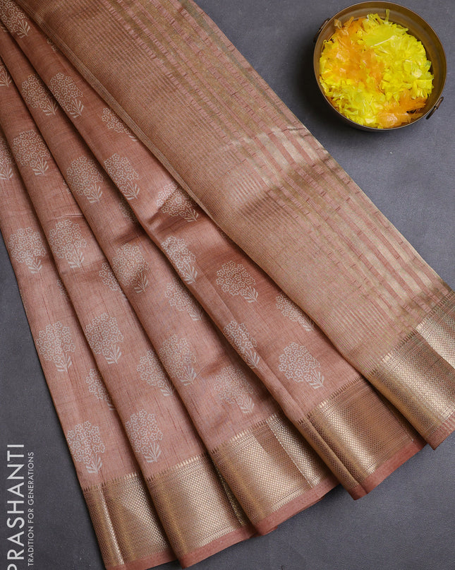 Semi raw silk saree pastel peach with allover butta prints and zari woven border