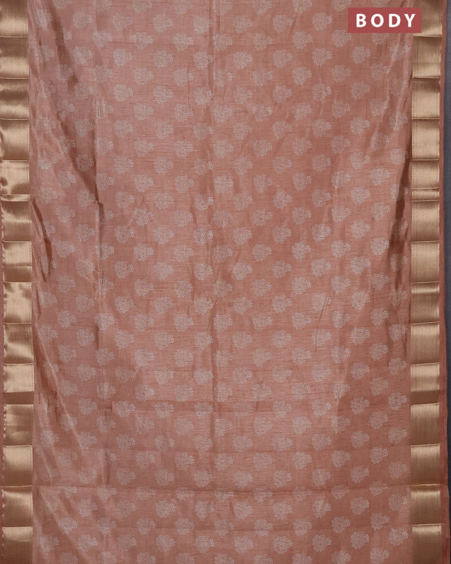 Semi raw silk saree pastel peach with allover butta prints and zari woven border